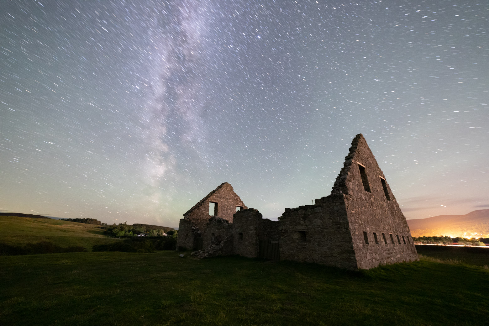 A very short star trail at Ruthven barracks in August 2022 - the Milky Way is still prominent but the movement of the Earth is evident.
